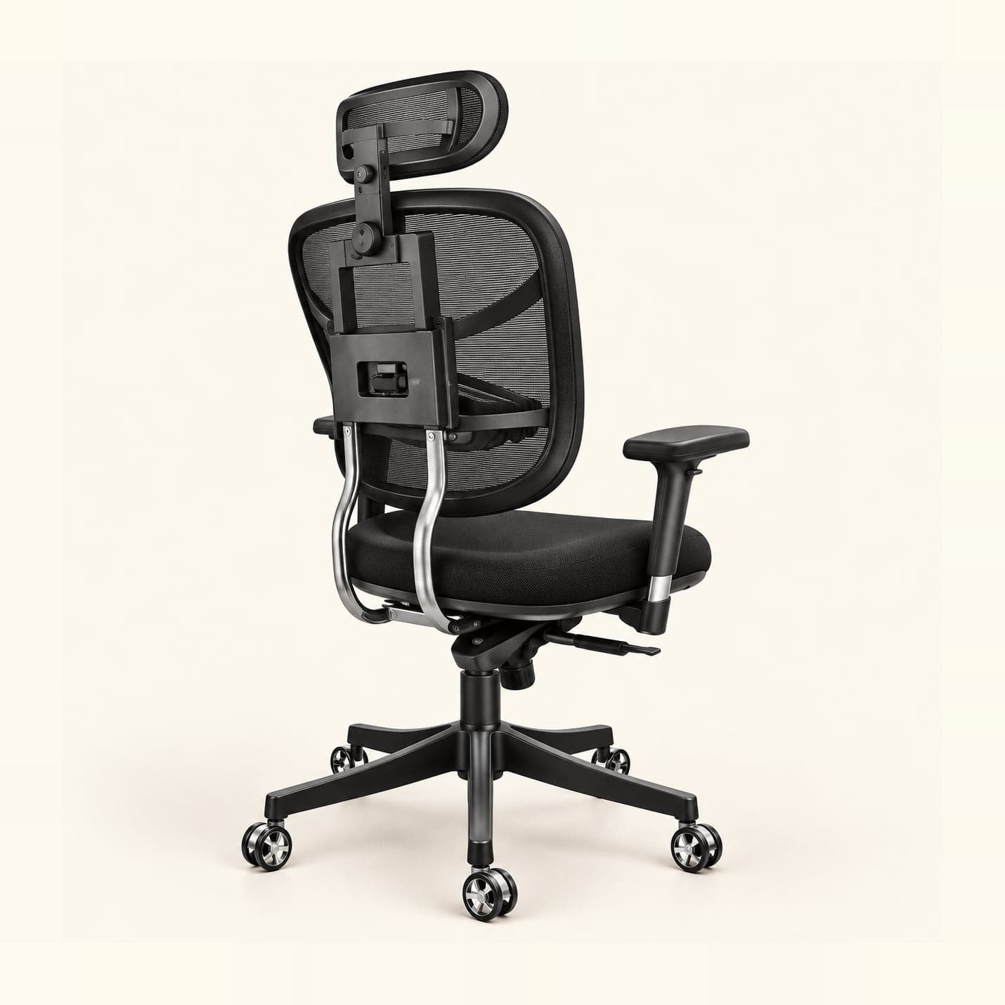 Chrome-Spine Mesh Chair with Headrest in black mesh, rear three-quarter view